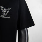 Black T-shirt sleeve with rhinestone LV motif