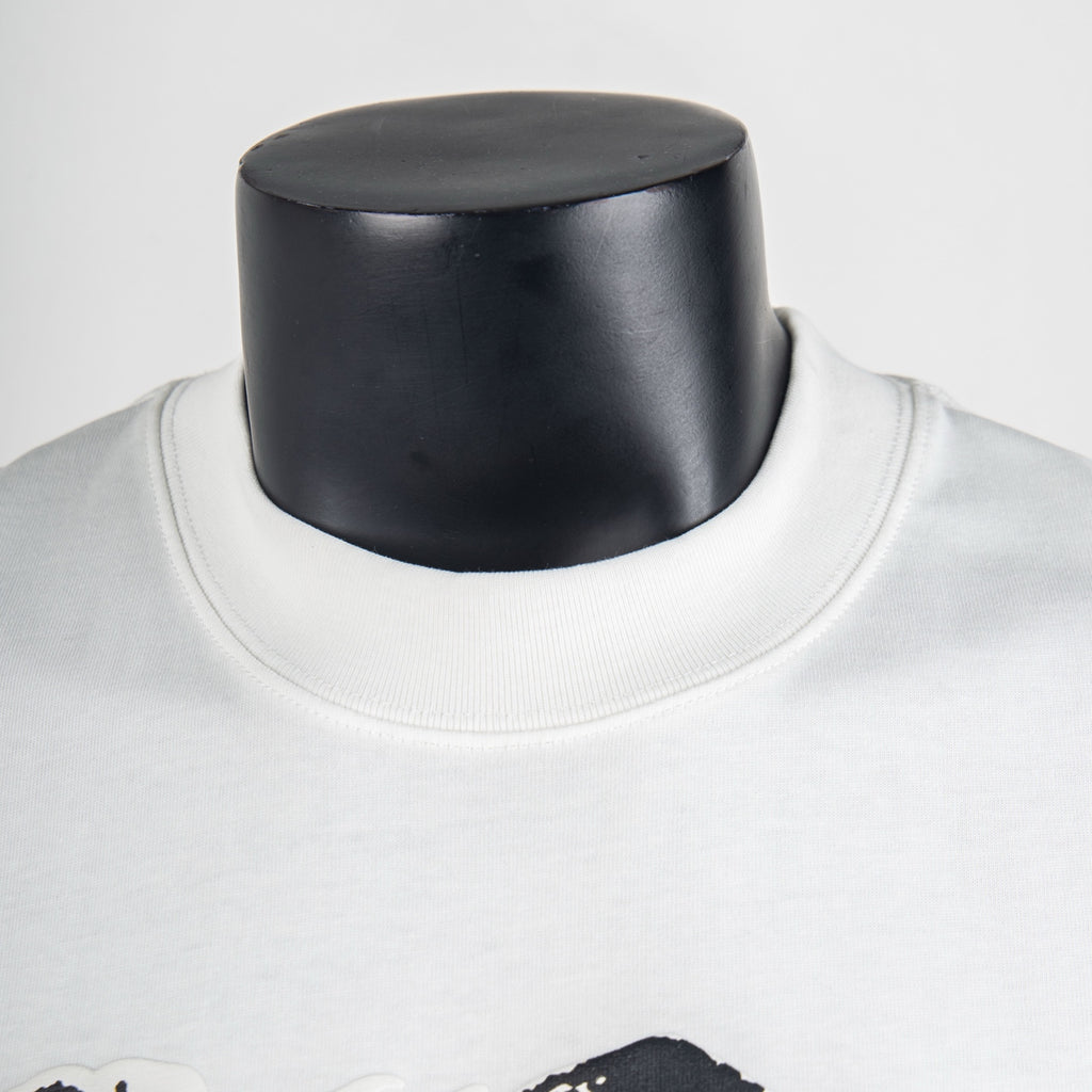 White T-shirt neckline close-up with ribbed crew collar