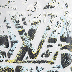 White T-shirt graphic pattern close-up with black and yellow lettering