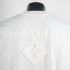 White T-shirt back with raised diamond logo and embossed text detail