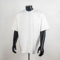 White short-sleeve T-shirt with crew neck and small chest logo patch