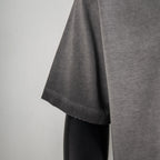 Gray T-shirt sleeve and hem with side drape