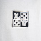 Front logo patch on white Louis Vuitton T-shirt
