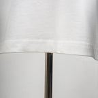 Louis Vuitton white T-shirt hem stitching close-up