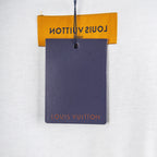 Louis Vuitton clothing tag on white T-shirt with orange label