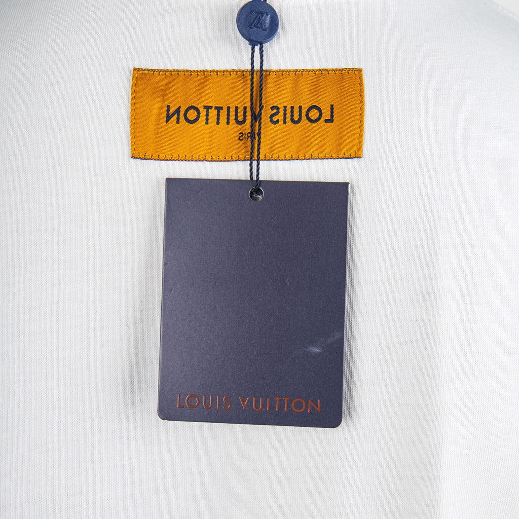 White T-shirt with Louis Vuitton hang tag and yellow label