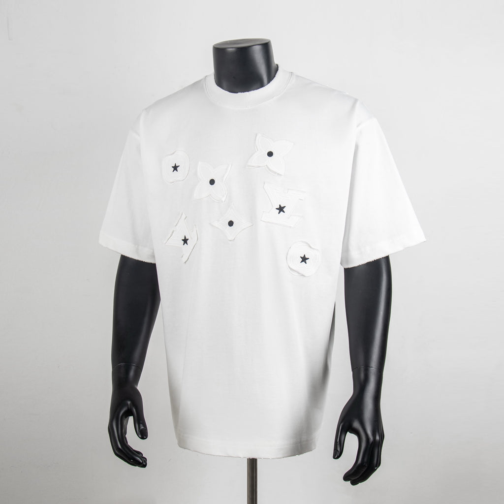 White short-sleeve T-shirt with star appliqués on the front