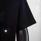 Black T-shirt sleeve and hem with circular star emblem