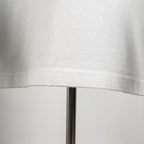 White T-shirt lower hem with double-stitched seam