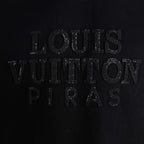 Black T-shirt with textured Louis Vuitton lettering logo detail