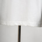 Louis Vuitton white T-shirt hem with visible stitching and drop hemline