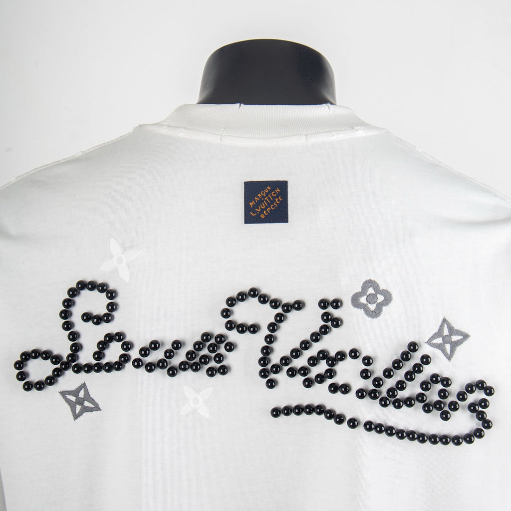 Louis Vuitton short-sleeve T-shirt back with black beaded designs and small brand patch