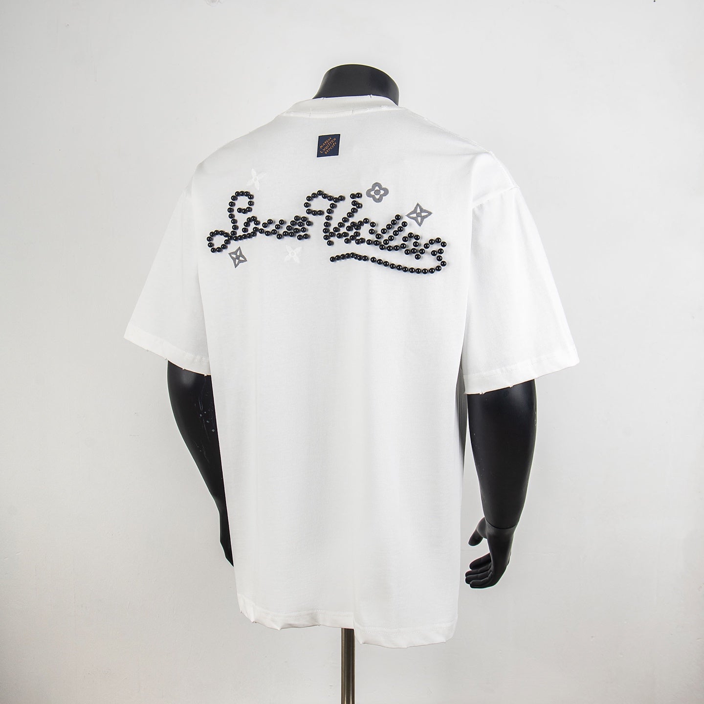 Louis Vuitton short-sleeve T-shirt, white, with large black beaded graphic on back