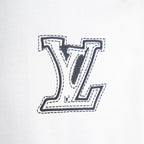 Louis Vuitton white short-sleeve shirt with large LV logo patch
