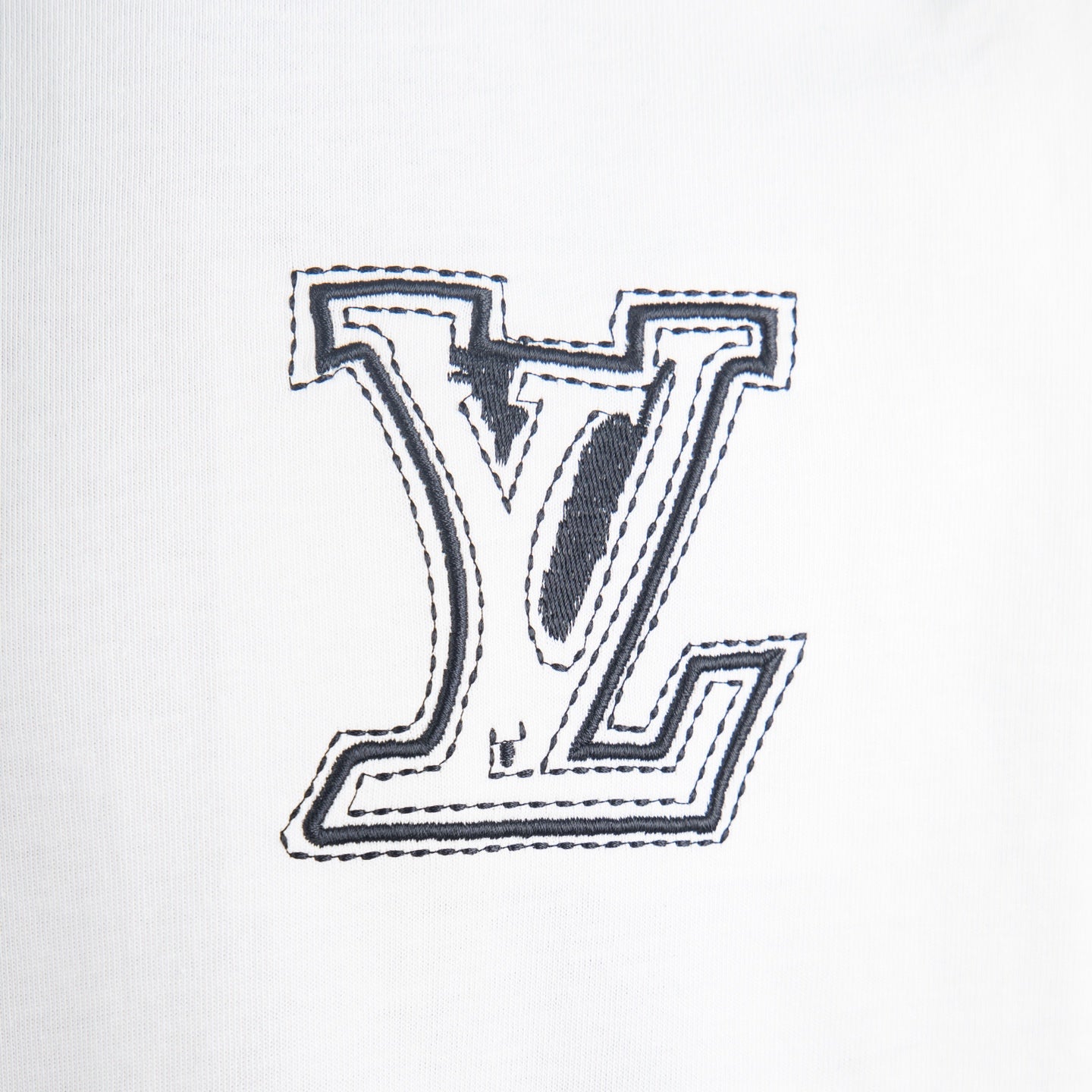 Louis Vuitton white short-sleeve shirt with large LV logo patch