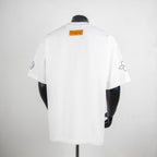 Louis Vuitton white crewneck short-sleeve shirt, back view with side sleeve graphic