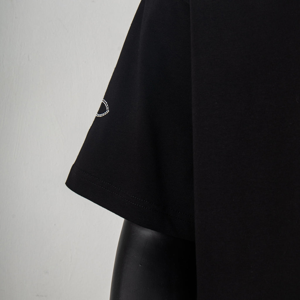 Louis Vuitton black short-sleeve T-shirt, side view with small sleeve logo