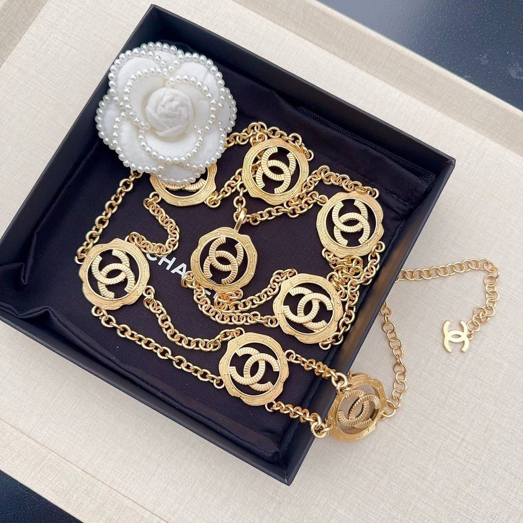 Gold-tone chain belt featuring round interlocking CC medallion charms on double chains