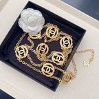 Gold-tone chain belt featuring round interlocking CC medallion charms on double chains