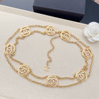 Gold-tone chain belt with round interlocking CC medallion charms and layered links