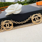 Gold-tone chain belt with two large round interlocking CC medallion charms
