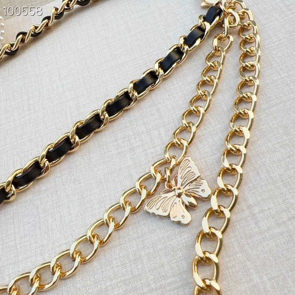 Chanel belt with gold-tone chain and black-link chain, butterfly charm on a small loop