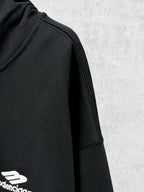 Balenciaga black hoodie sleeve with small side logo print and angled cuff