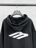 Balenciaga black pullover hoodie with large front logo and drawstring hood