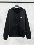 Balenciaga black long-sleeve pullover hoodie with drawstring and front pocket