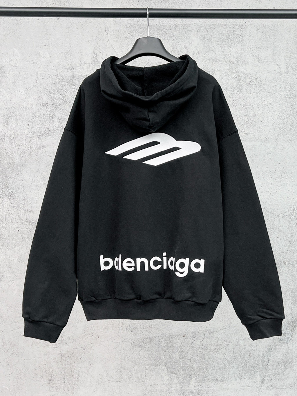 Balenciaga black hoodie with large back graphic, front logo print, and drawstring