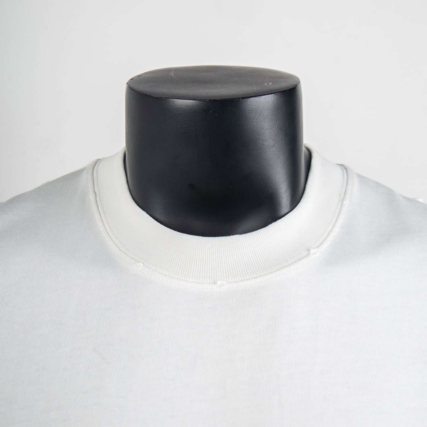 White T-shirt neckline with ribbed crew collar and smooth jersey fabric