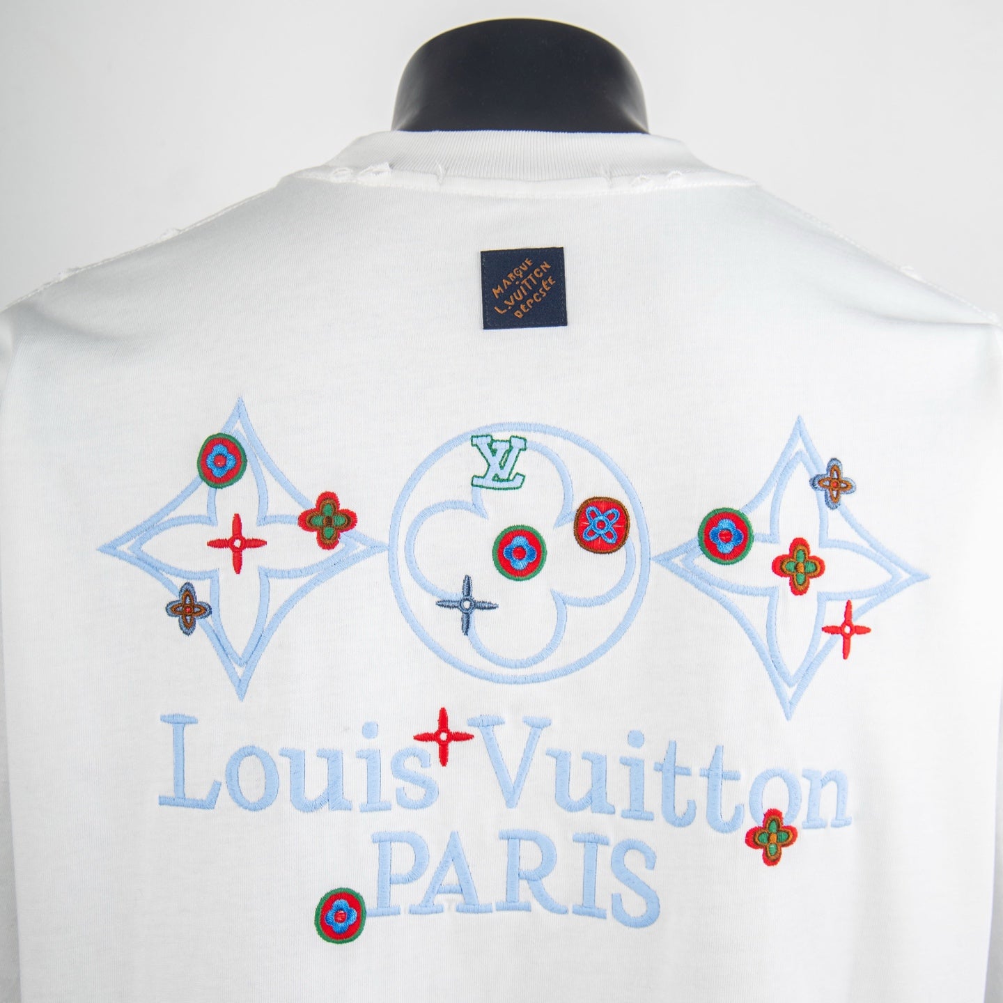 White T-shirt back print with Louis Vuitton PARIS text and colorful emblem icons