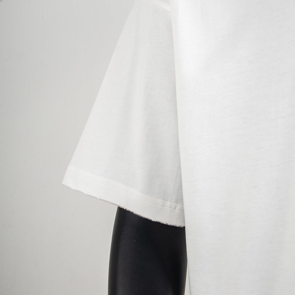 White short-sleeve T-shirt side view with straight hem and visible stitching
