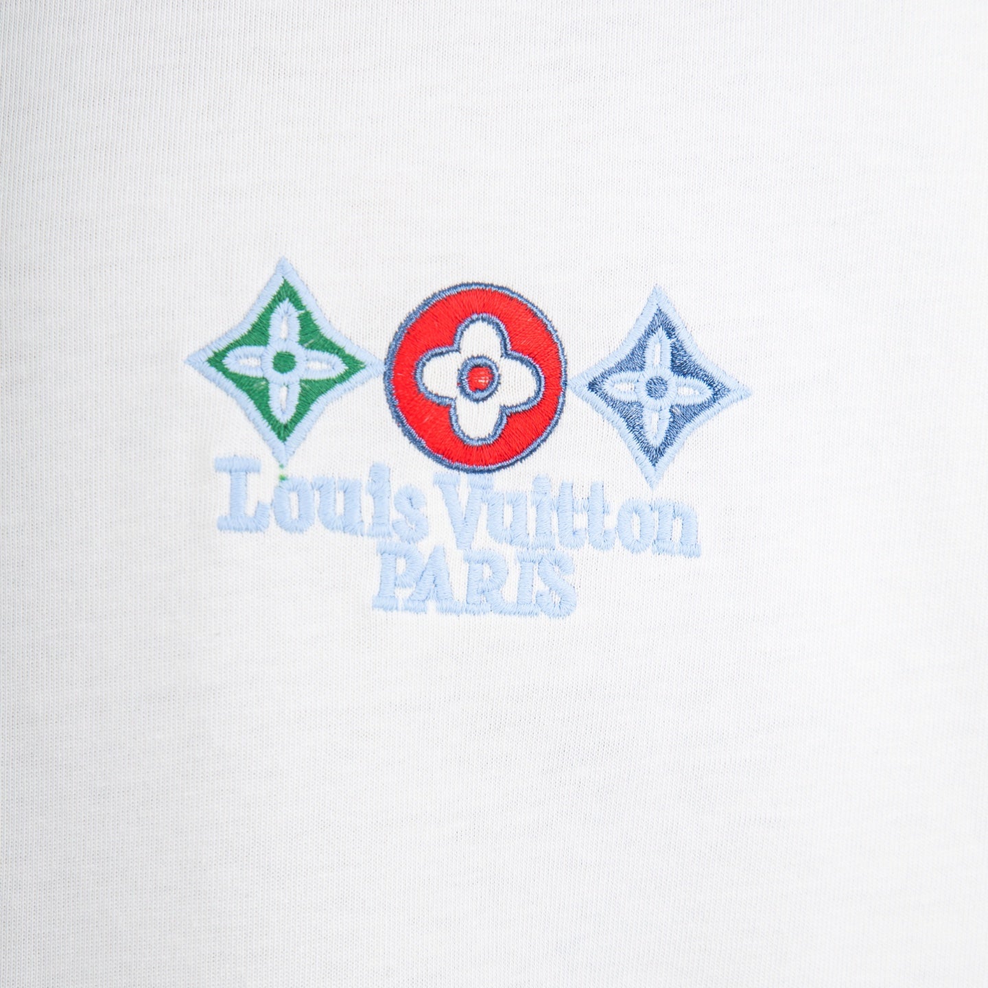 White T-shirt with multicolor Louis Vuitton PARIS emblem and star motifs