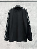 Long-sleeve black shirt with white Balenciaga logo stripe sleeves