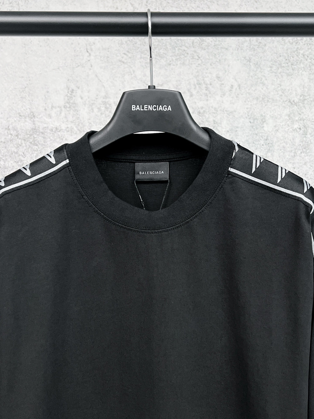 Balenciaga-branded long-sleeve black shirt neckline with logo stripe sleeves