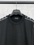 Balenciaga-branded long-sleeve black shirt neckline with logo stripe sleeves