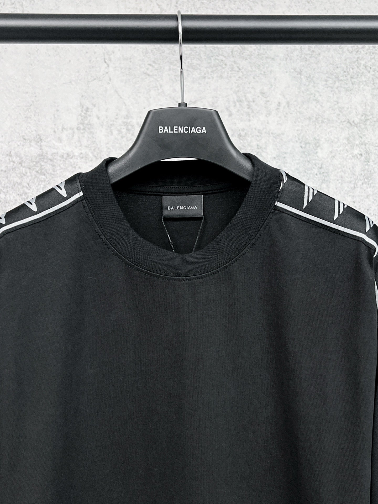 Balenciaga-branded long-sleeve black shirt neckline with logo stripe sleeves