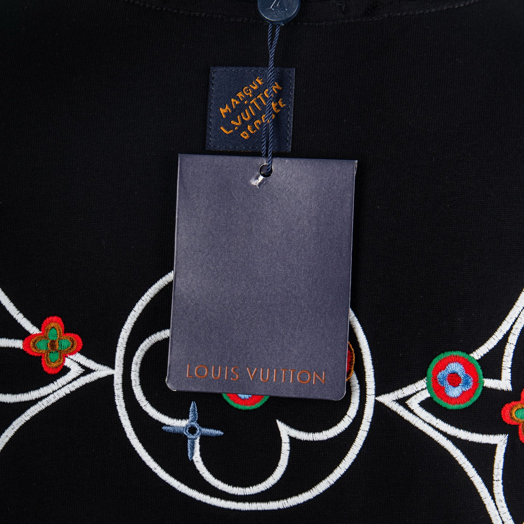 Louis Vuitton T-shirt neck label with attached tag