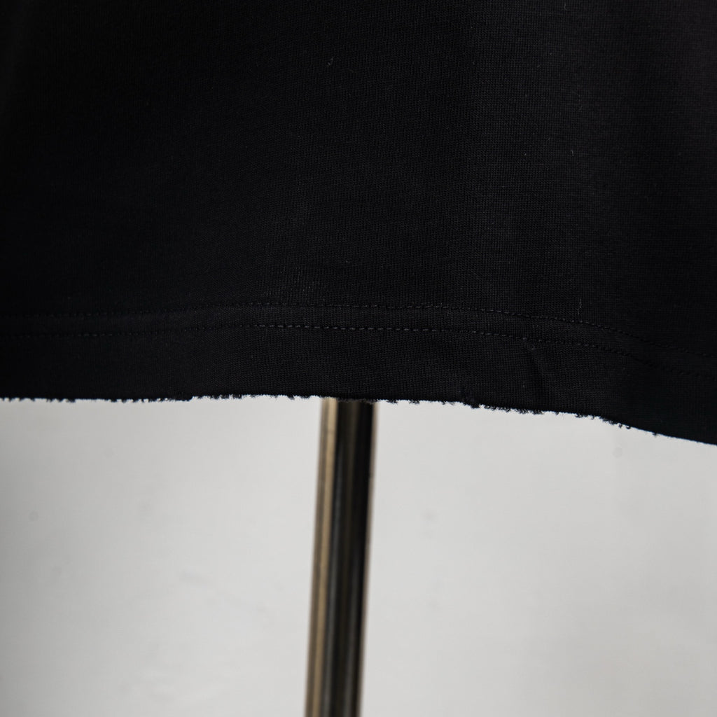 Louis Vuitton black T-shirt bottom hem with visible stitching