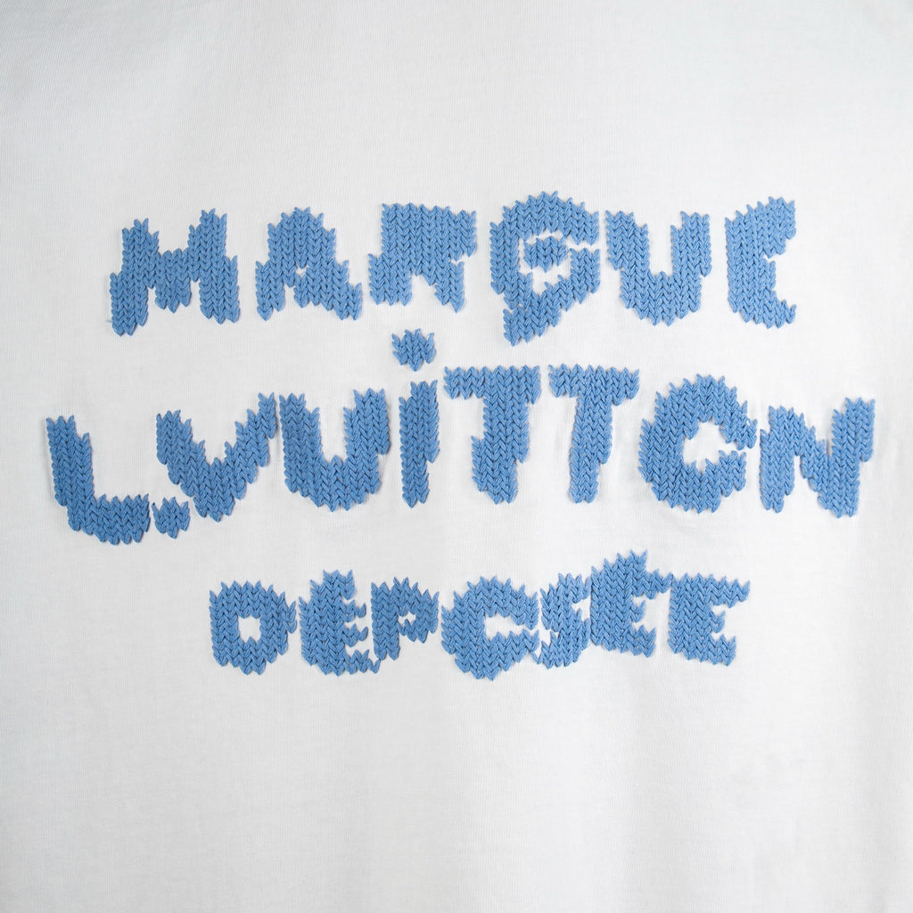 White T-shirt with blue embroidered text logo across front