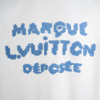 White T-shirt with blue embroidered text logo across front