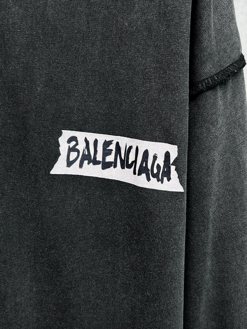 Balenciaga logo patch on black long-sleeve T-shirt chest