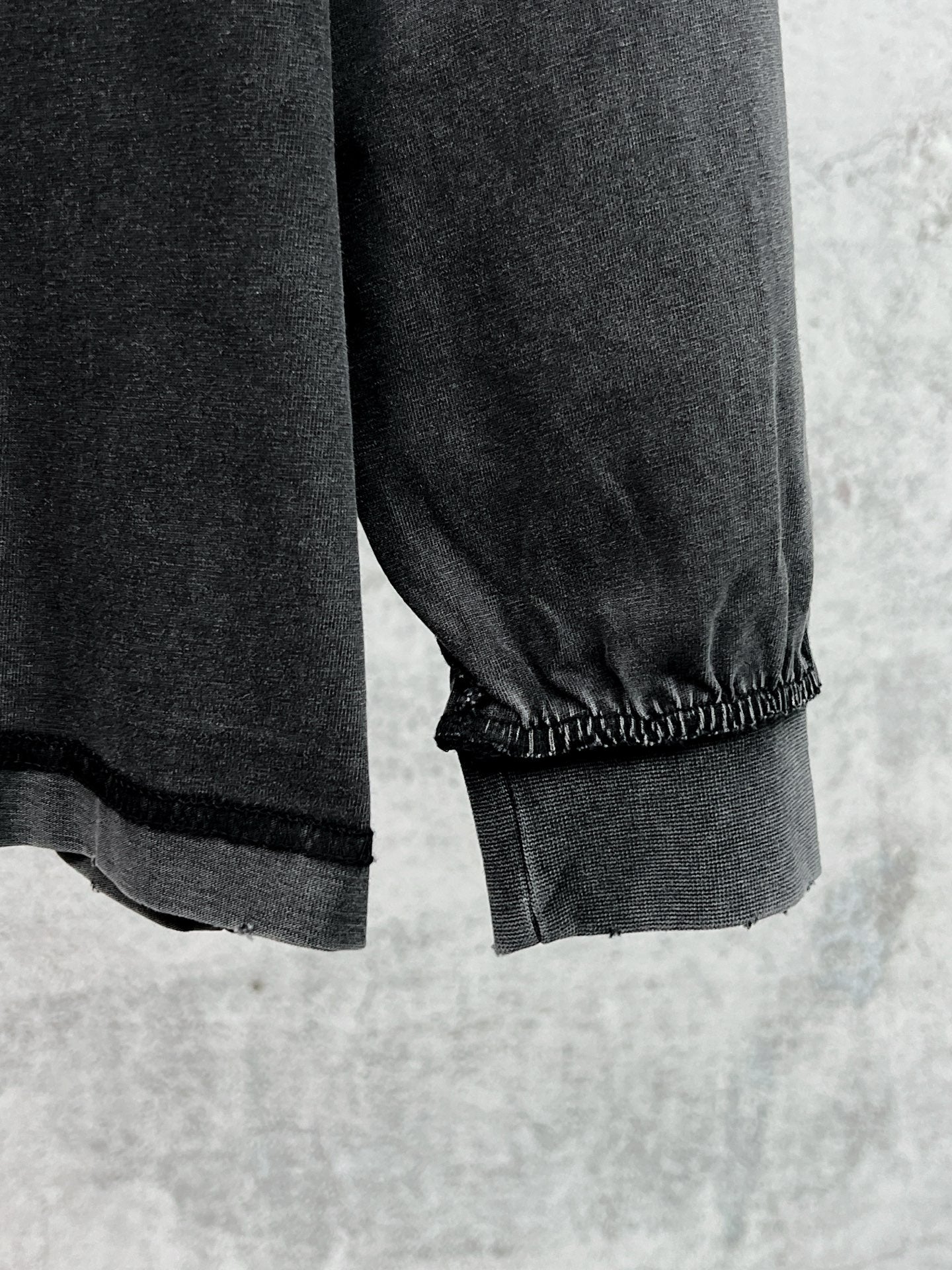 Balenciaga black long-sleeve T-shirt with elastic cuff and hem detail