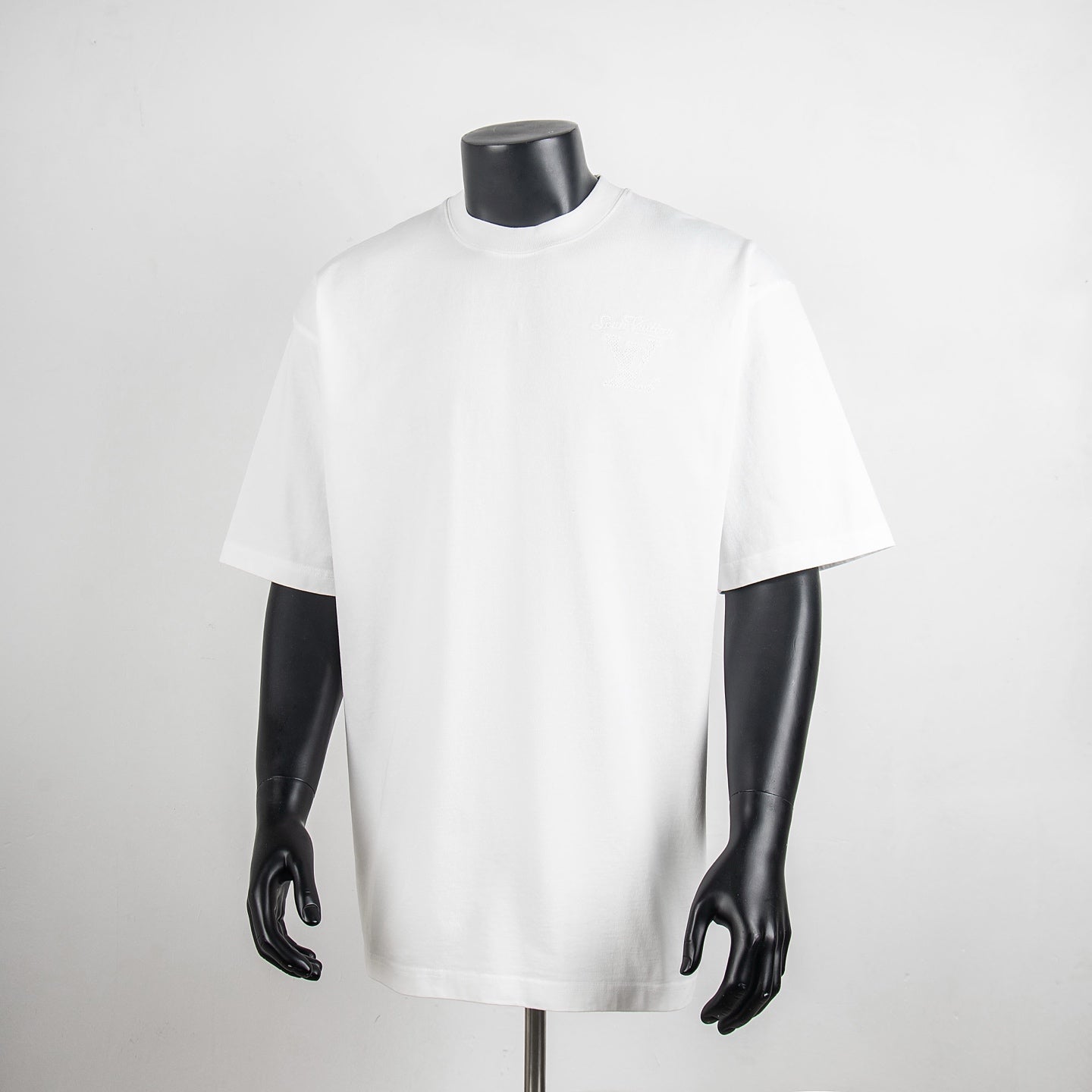 Louis Vuitton white short-sleeve T-shirt with crew neck, plain front.