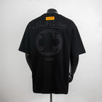 Black short-sleeve T-shirt with Louis Vuitton back graphic and PARIS text.