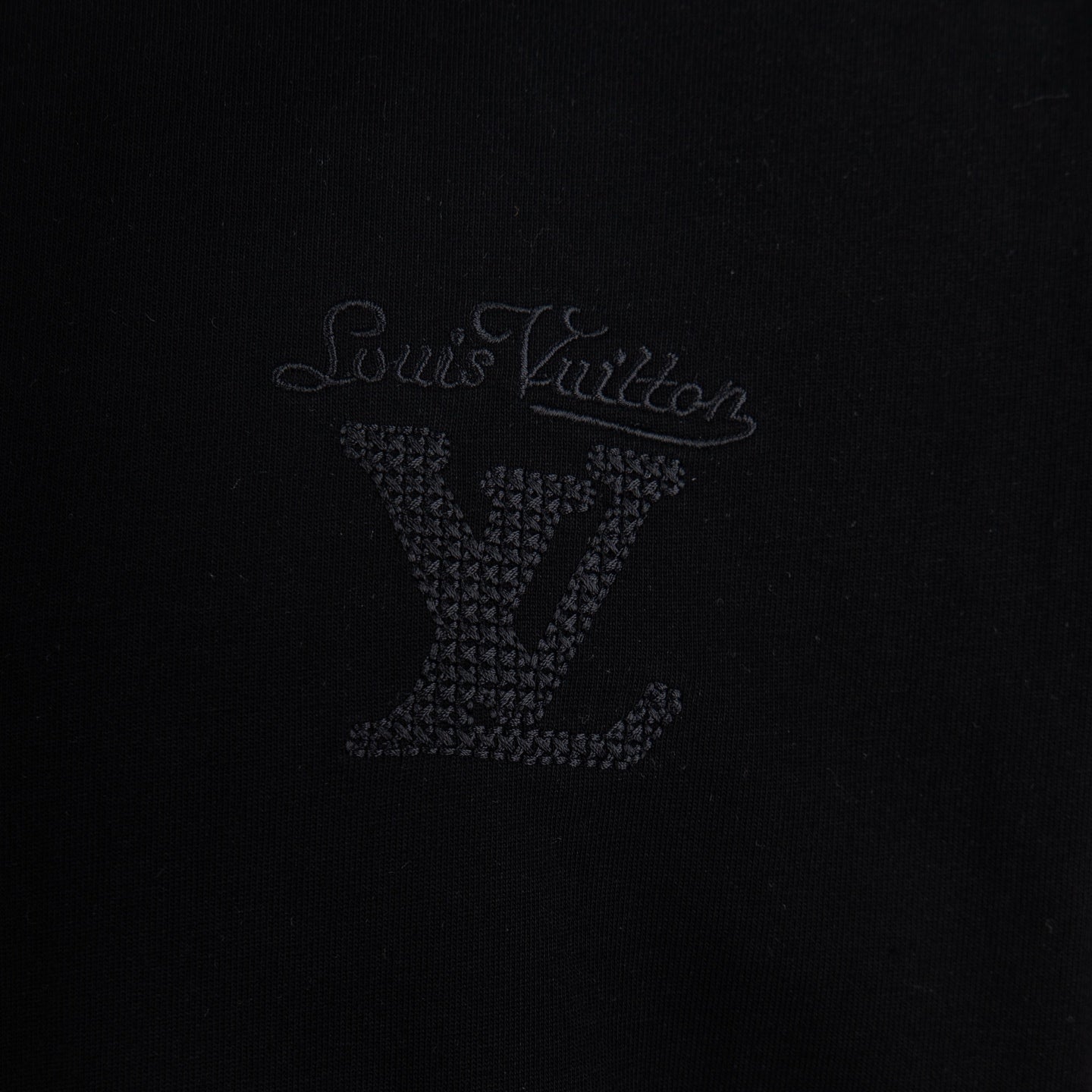 Black T-shirt front logo with Louis Vuitton signature and LV emblem.