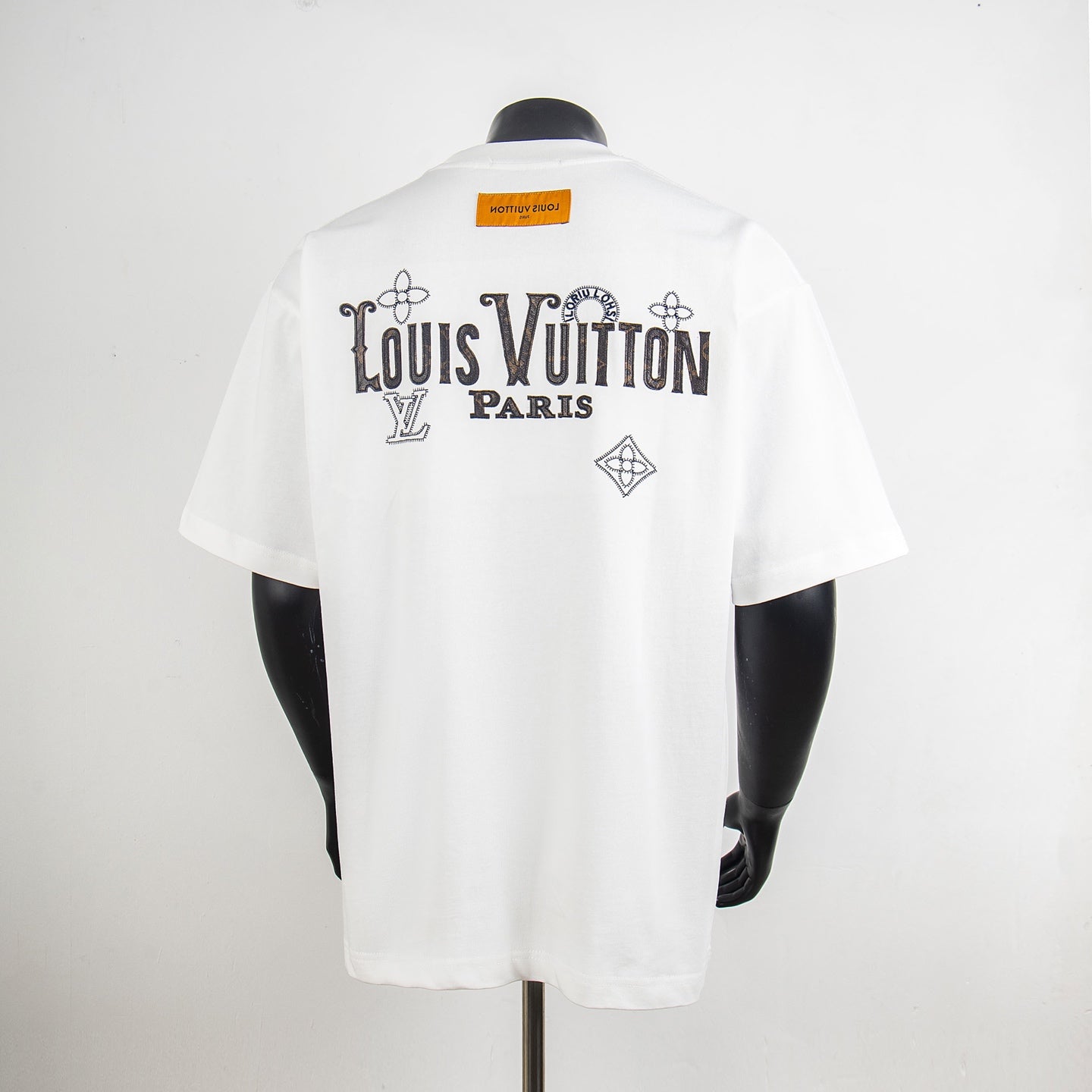 White T-shirt with Louis Vuitton Paris back graphic and diamond emblem