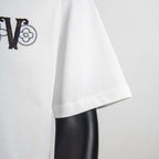 White T-shirt sleeve and side hem with partial 'LV' logo visible