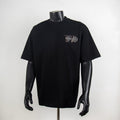Black T-shirt with small chest emblem graphic